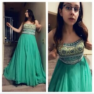 Sherri Hill green prom dress maxi